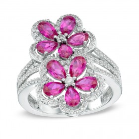 0.65 ct Ladies Round Cut Diamond And Ruby Flower Ring